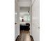 Hallway view of the main bedroom and hardwood floors at 4417 Village Square Ln, Stone Mountain, GA 30083