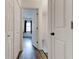 Hallway shows a view into a room with black curtains and has access to closet storage at 4417 Village Square Ln, Stone Mountain, GA 30083