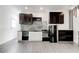 Contemporary kitchen featuring two-tone cabinets, modern appliances, and a stylish design at 4417 Village Square Ln, Stone Mountain, GA 30083