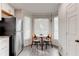 Eat-in kitchen featuring a cozy breakfast nook with ample natural light at 4417 Village Square Ln, Stone Mountain, GA 30083