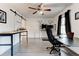 This office space features two desk setups, sleek flooring, and a large window at 4417 Village Square Ln, Stone Mountain, GA 30083