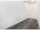 Unfinished basement room with concrete floor and plain white walls at 1260 Monroe Ne Dr, Atlanta, GA 30306