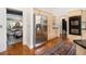 Open kitchen with stainless steel refrigerator and connection to the dining and living areas at 1260 Monroe Ne Dr, Atlanta, GA 30306