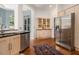 Spacious kitchen with stainless steel appliances, light wood cabinets, and access to a breakfast nook at 1260 Monroe Ne Dr, Atlanta, GA 30306