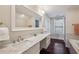 Modern bathroom with marble countertop, double sinks, and elegant fixtures at 2545 Tilson Se Dr, Atlanta, GA 30317
