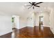 Well-lit bedroom featuring hardwood floors, ceiling fan, and bright natural light at 2545 Tilson Se Dr, Atlanta, GA 30317