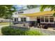 A sunny outdoor patio at La Fonda restaurant, offering a pleasant dining experience with ample seating at 2545 Tilson Se Dr, Atlanta, GA 30317