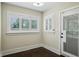 Bright and sunny sun room featuring plenty of natural light with windows and exterior door at 2545 Tilson Se Dr, Atlanta, GA 30317