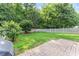 Well-maintained backyard with manicured lawn, brick patio, and privacy fence, perfect for outdoor enjoyment at 3427 Hampreston Nw Way, Kennesaw, GA 30144