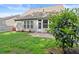 Backyard featuring a well-maintained lawn, patio area, and privacy fencing for outdoor living and enjoyment at 3427 Hampreston Nw Way, Kennesaw, GA 30144