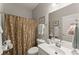 Bathroom featuring a vanity and toilet, complemented by neutral tones and decorative accents at 3427 Hampreston Nw Way, Kennesaw, GA 30144