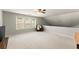Upstairs bonus room featuring natural light and neutral colors, perfect for a Gathering room at 3427 Hampreston Nw Way, Kennesaw, GA 30144