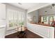 Cozy breakfast nook with shuttered windows providing natural light and hardwood flooring at 3427 Hampreston Nw Way, Kennesaw, GA 30144
