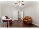 Cozy sitting room features hardwood floors and comfortable armchairs, perfect for relaxation at 3427 Hampreston Nw Way, Kennesaw, GA 30144