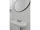Powder room with pedestal sink and modern fixtures at 2130 Executive Dr, Duluth, GA 30096