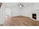 Inviting living room with hardwood floors, fireplace, and ample space for seating and entertaining at 2130 Executive Dr, Duluth, GA 30096