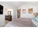 Bright bedroom with a modern dresser and a comfortable bed, illuminated by natural light at 5696 Union Pointe Dr, Union City, GA 30291