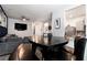 Open-concept layout with a dining table and access to the living room and kitchen at 5696 Union Pointe Dr, Union City, GA 30291