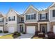 Charming townhouse with a brick front and attached one-car garage, nestled in a desirable community at 5696 Union Pointe Dr, Union City, GA 30291