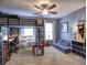 Spacious bedroom with a loft bed, study area, and cozy seating, ideal for a comfort and functionality at 658 Vinings Estates Se Dr, Mableton, GA 30126