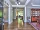 Open foyer with hardwood floors showcasing the living space and elegant details at 658 Vinings Estates Se Dr, Mableton, GA 30126