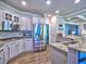 Modern kitchen with stainless steel appliances, granite countertops, and white cabinets offering plenty of storage at 658 Vinings Estates Se Dr, Mableton, GA 30126