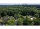 Aerial view featuring the property with lush greenery and nearby city skyline at 1296 Plaza Sw Ave, Atlanta, GA 30310
