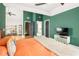 Bright bedroom with wood floors, plenty of closet space, and an open doorway at 1296 Plaza Sw Ave, Atlanta, GA 30310
