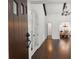 Inviting entryway with hardwood floors and arched doorways leading to formal dining at 1423 Briarcliff Ne Rd, Atlanta, GA 30306