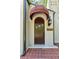 Elegant front door with a arched awning and charming exterior details at 1423 Briarcliff Ne Rd, Atlanta, GA 30306
