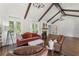 Inviting living area with hardwood floors, fireplace, stylish furnishings, and natural light at 1423 Briarcliff Ne Rd, Atlanta, GA 30306