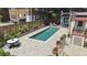 Aerial shot of a backyard with a pool, outdoor dining, and lounge seating at 1423 Briarcliff Ne Rd, Atlanta, GA 30306