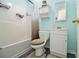 A bathroom with a shower/bath, toilet, vanity, and wall cabinet at 3372 Springside Rdg, Decatur, GA 30034