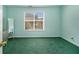 A bedroom with mint green paint and a large window at 3372 Springside Rdg, Decatur, GA 30034