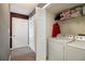 A laundry room area with a washer and dryer hook up and closet space for storage at 3372 Springside Rdg, Decatur, GA 30034