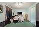The living room features an expansive area of green carpeting and large blackout curtains at 3372 Springside Rdg, Decatur, GA 30034