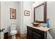 Half bath features a designer bowl sink and custom cabinet at 49 Waterside Se Dr, Cartersville, GA 30121
