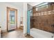 Elegant bathroom with shower and exterior door at 49 Waterside Se Dr, Cartersville, GA 30121
