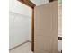 Walk-in closet featuring neutral walls, metal racks and wood trim at 49 Waterside Se Dr, Cartersville, GA 30121
