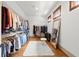 Walk-in closet featuring built-in shelving and ample storage space at 49 Waterside Se Dr, Cartersville, GA 30121