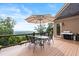 Relaxing deck with BBQ grill, table and chairs and panoramic vista views at 49 Waterside Se Dr, Cartersville, GA 30121