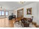 Spacious dining area adjacent to living space featuring hardwood floors and natural light at 49 Waterside Se Dr, Cartersville, GA 30121