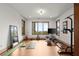 Well-equipped exercise room with panoramic views, hardwood floors, full-length mirror, and various exercise machines at 49 Waterside Se Dr, Cartersville, GA 30121