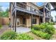 Exterior view of a home, showcasing the lower-level patio and landscaped yard at 49 Waterside Se Dr, Cartersville, GA 30121