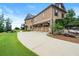 Beautiful home with a four-car garage and a well-manicured lawn and landscaping at 49 Waterside Se Dr, Cartersville, GA 30121