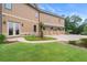 Stunning property with a four-car garage, lush lawn, and impeccable landscaping at 49 Waterside Se Dr, Cartersville, GA 30121