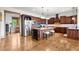 Spacious kitchen with a large center island, stainless steel appliances, and wood cabinets at 49 Waterside Se Dr, Cartersville, GA 30121