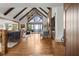Bright, open living room with vaulted ceilings, hardwood floors, fireplace, and scenic views at 49 Waterside Se Dr, Cartersville, GA 30121