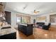 Open-concept living area with counter seating, island and comfortable lounge space with scenic views at 49 Waterside Se Dr, Cartersville, GA 30121