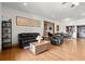 Cozy living area featuring hardwood floors, comfortable seating, and a decorative coffee table at 49 Waterside Se Dr, Cartersville, GA 30121
